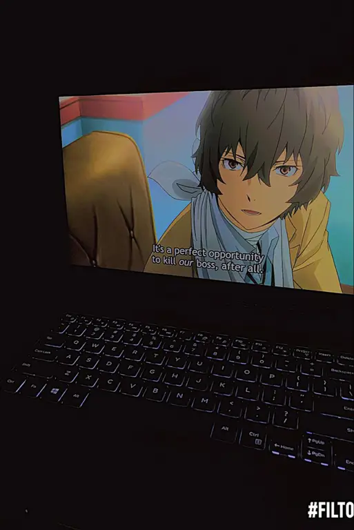 Selamat Menikmati Anime Gambar seseorang yang sedang menonton anime di rumah
