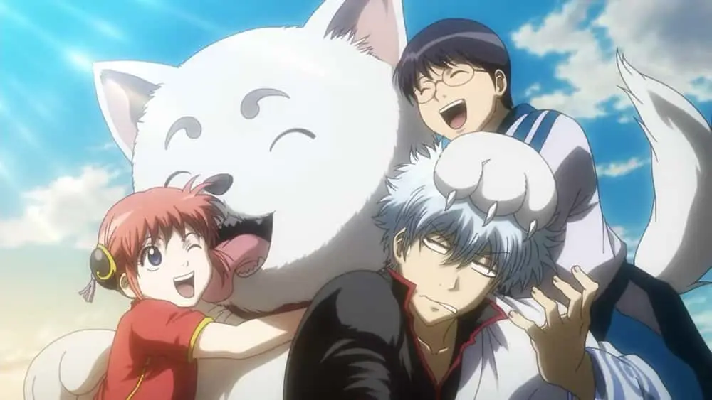 Menikmati anime bersama teman Gambar sekelompok teman yang sedang menonton anime bersama-sama